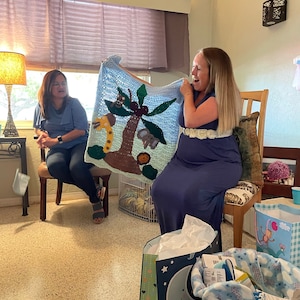 Sheila added a photo of their purchase