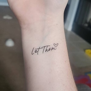 Let Them tattoo in 2023  Unique wrist tattoos Tattoos for daughters  Cross tattoos for women