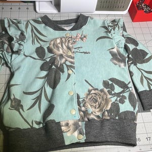 Ashleigh added a photo of their purchase