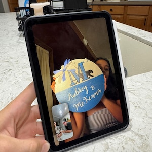 Angela added a photo of their purchase