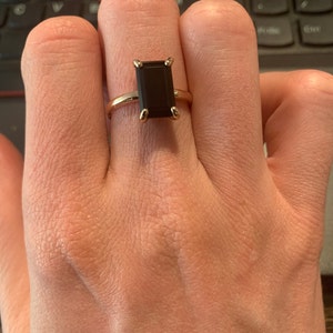 Kimber added a photo of their purchase