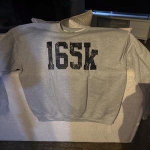 Angela added a photo of their purchase