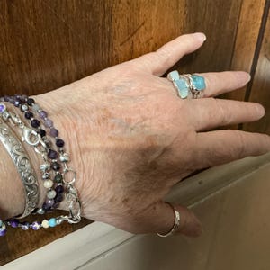 Customer photo from mu6bv3qm, Triple Raw Aquamarine Ring in Yellow Gold, Smooth Stones