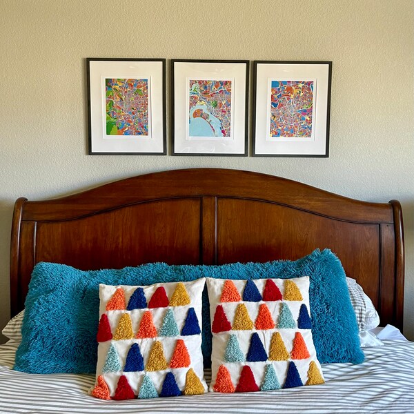 Lafayette, Indiana, a bridge over a river with buildings and a starry