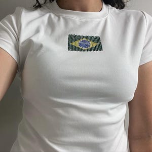 Beatriz added a photo of their purchase