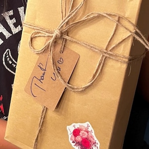 Angelica added a photo of their purchase