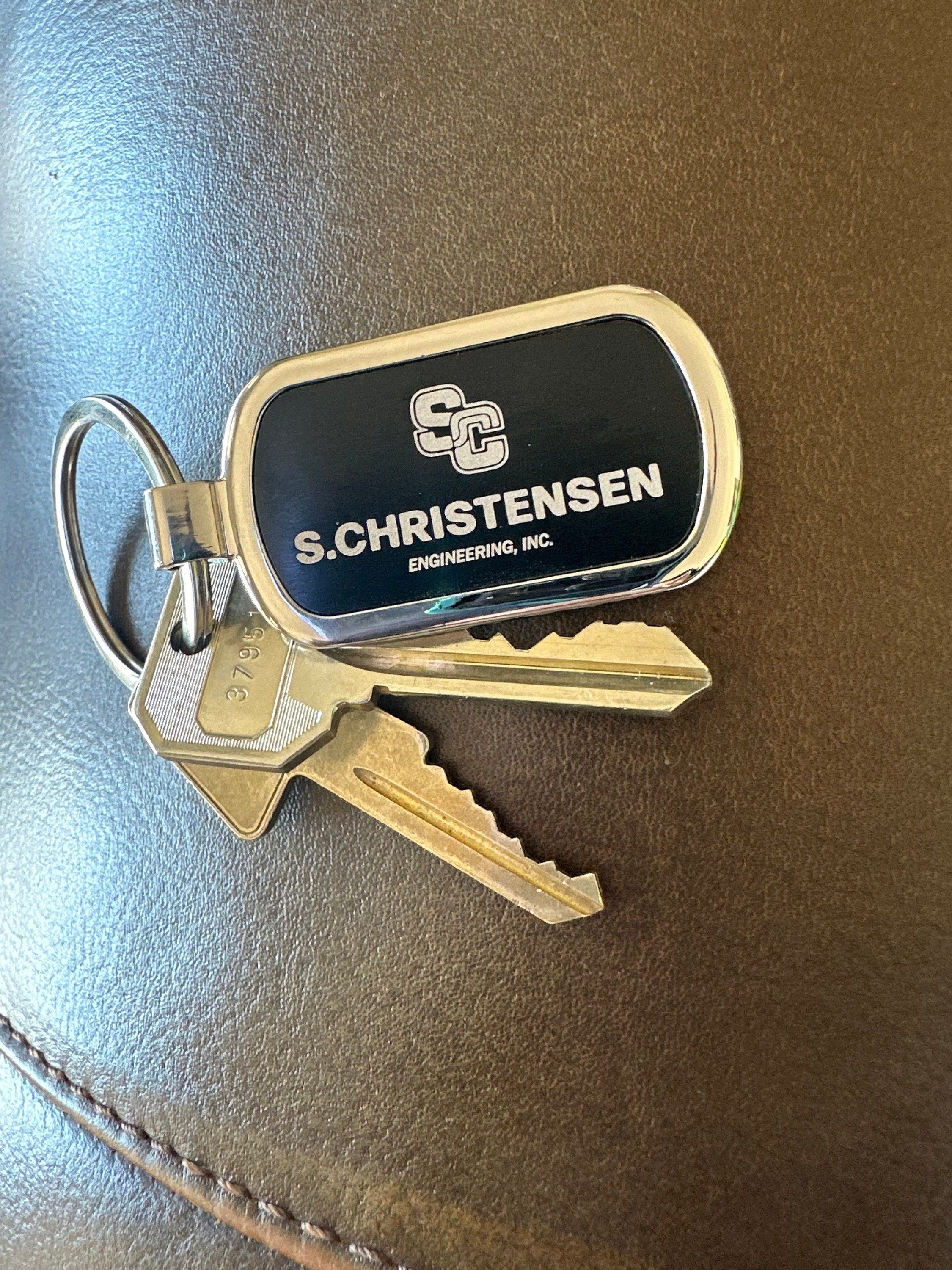 Customer photo of Custom Logo Etched Metal Keychain from VallieGirl101