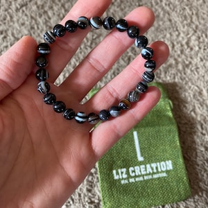 Sarah added a photo of their purchase