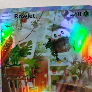 holographic rowlet pokemon card Rowlet - 18/236 - Cosmic Eclipse main image 1