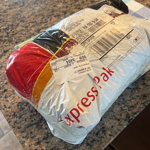 Laura adicionaram uma foto da sua compra