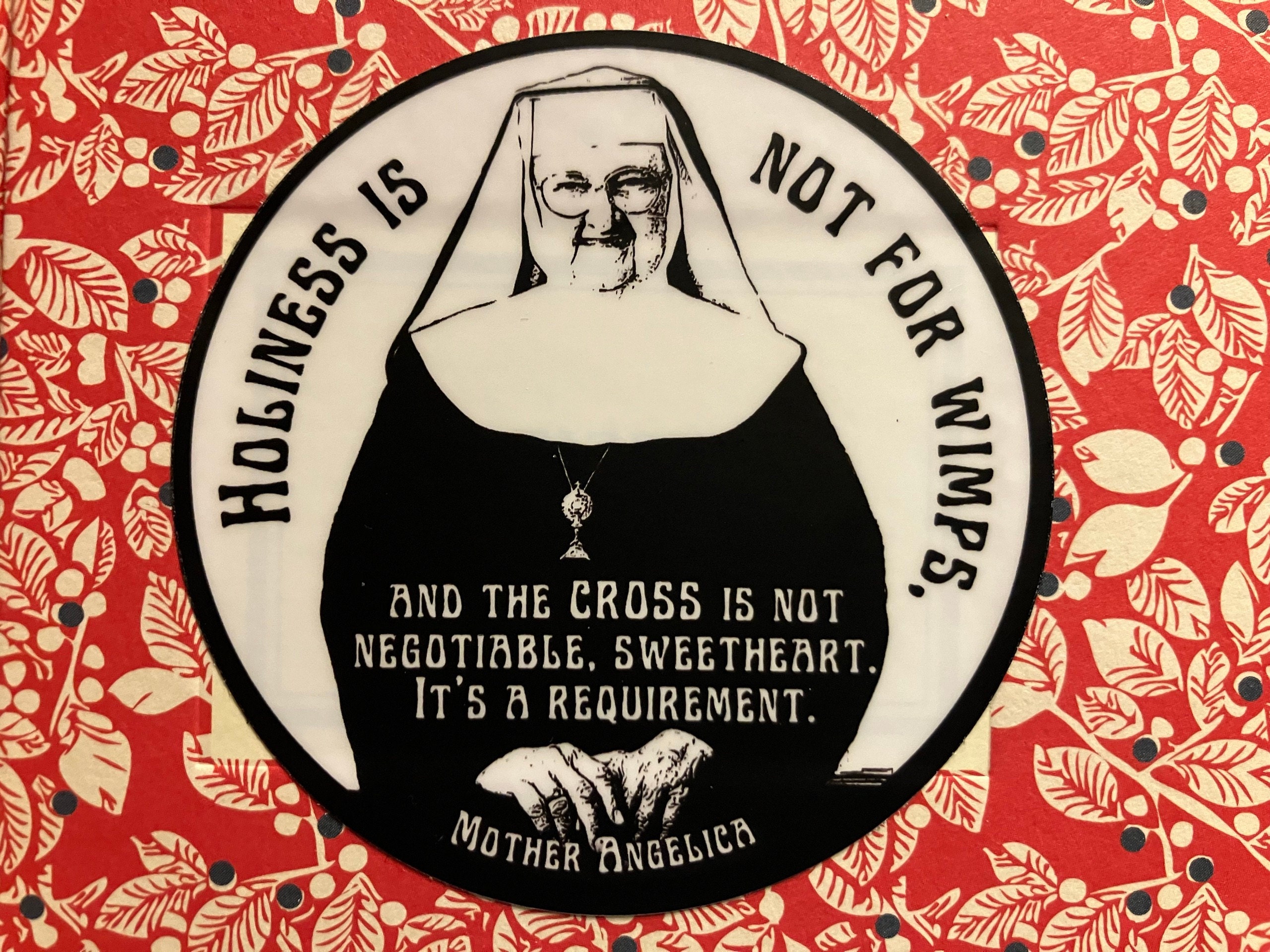Mother Angelica quote, &quot;Holiness is not for wimps and the cross is not negotiable, sweetheart, it&#39;s a requirement.”| Circle Catholic sticker