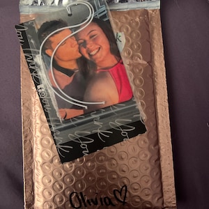 Olivia added a photo of their purchase