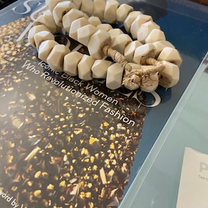 Kamilah added a photo of their purchase