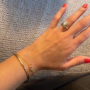 Arianne added a photo of their purchase