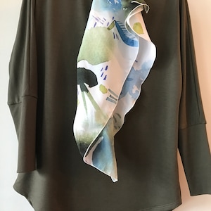 Donna added a photo of their purchase