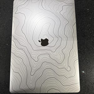 John added a photo of their purchase