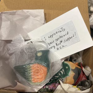 Kayla added a photo of their purchase