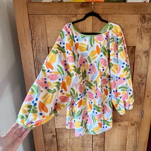 Sarah added a photo of their purchase