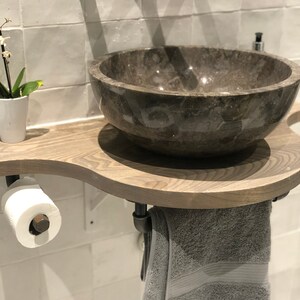 Elle added a photo of their purchase