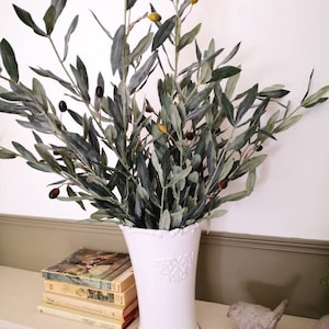 Marjorie added a photo of their purchase