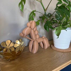 Samantha added a photo of their purchase