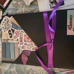 Lisa added a photo of their purchase