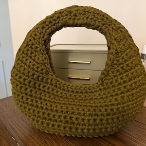 Sheila added a photo of their purchase