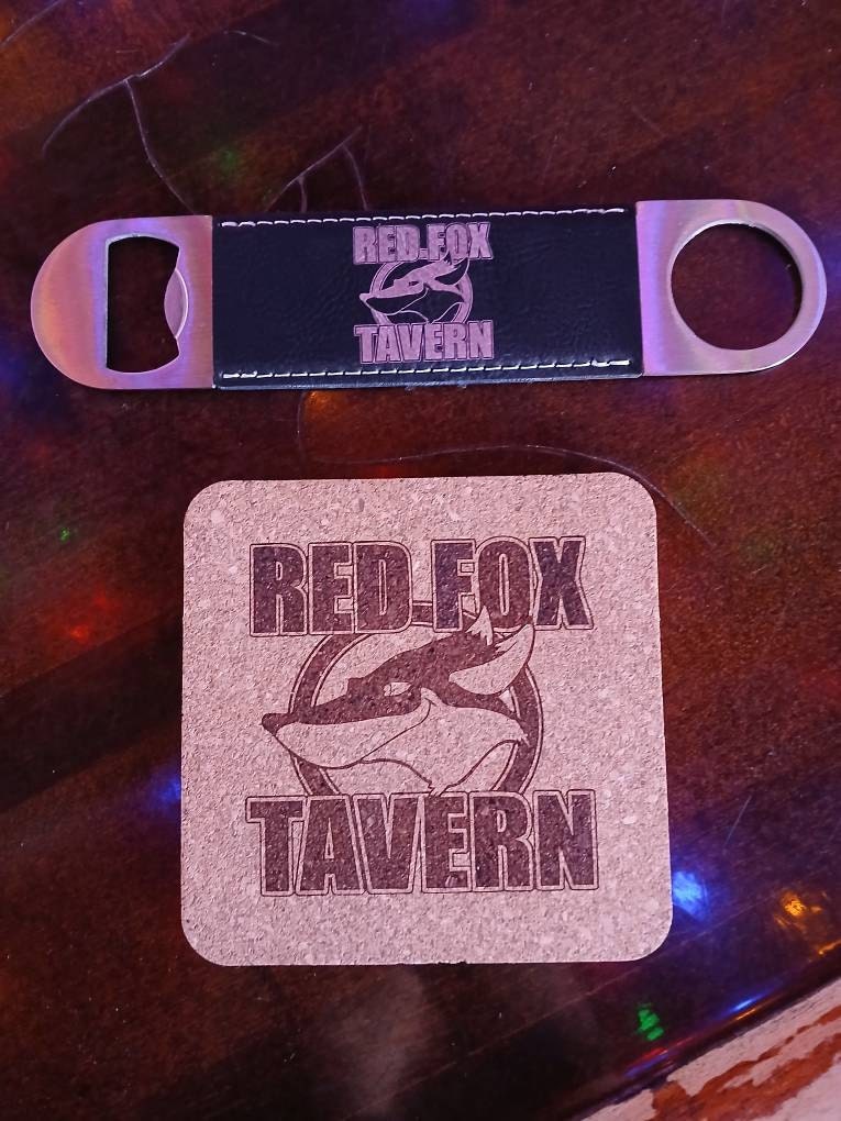 Customer photo of Custom Logo Engraved / Etched Leatherette Bottle Opener from Logan