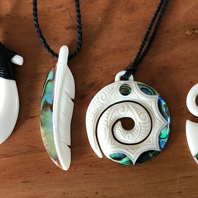 Bone Necklace: Hand-carved Maori Spiral Koru Pendant for Peace and