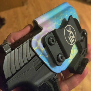 Ashley added a photo of their purchase
