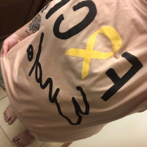 Lizzie added a photo of their purchase
