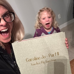 Caroline added a photo of their purchase