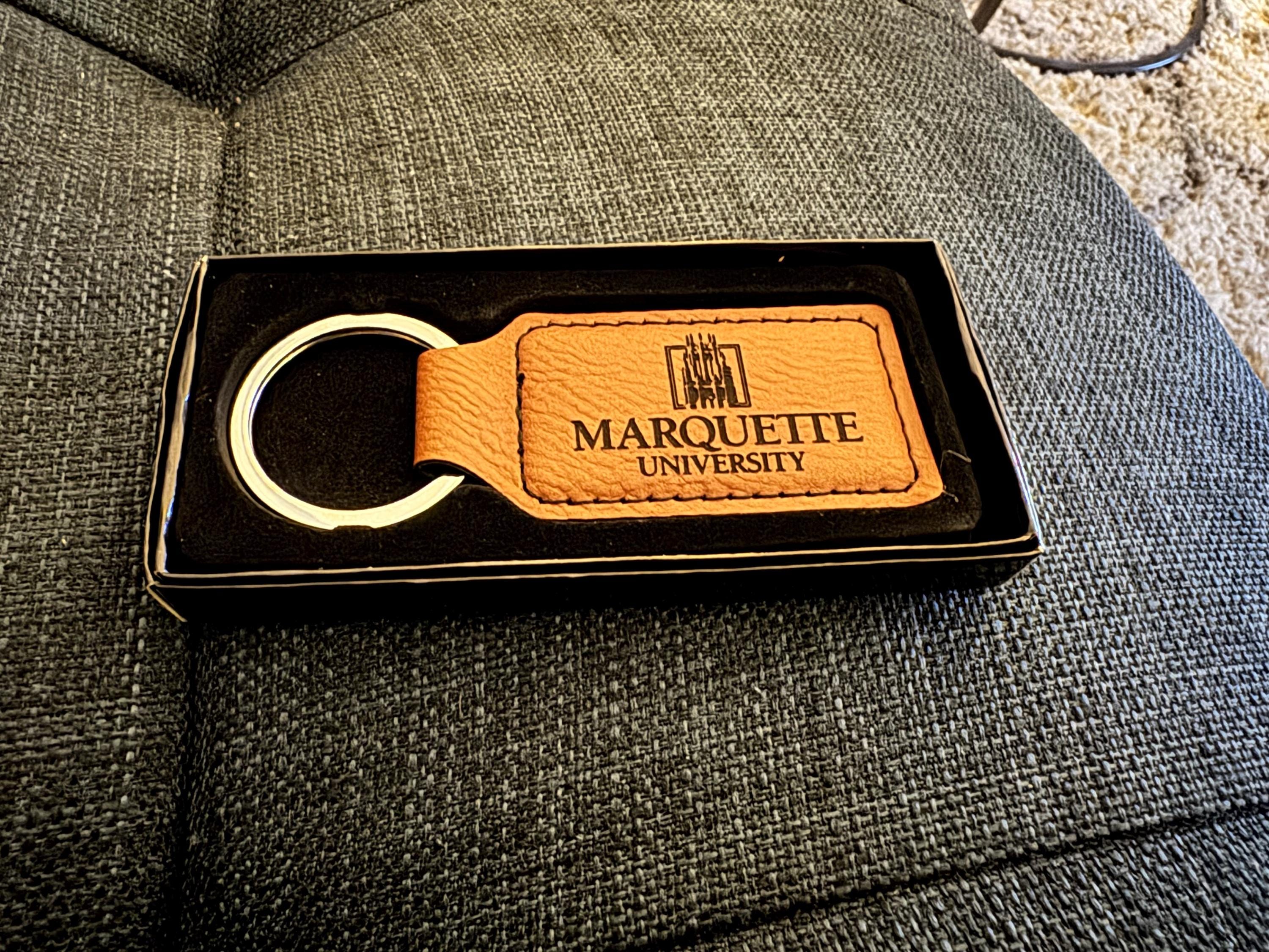 Customer photo of Custom Logo Engraved / Etched Leatherette Keychain from parthbhansali