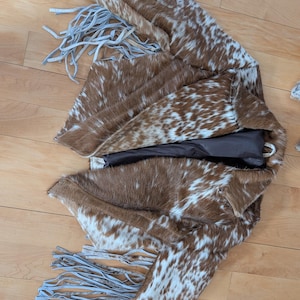 Sabrina added a photo of their purchase