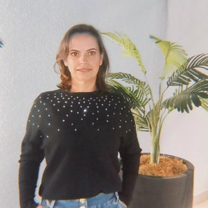Elisângela added a photo of their purchase