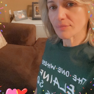 Elaine added a photo of their purchase
