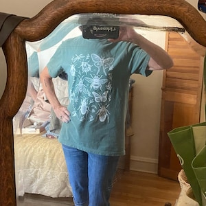 Marjorie added a photo of their purchase