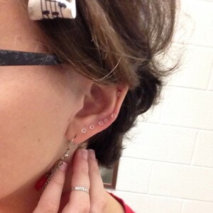 Plastic earring covers best sale