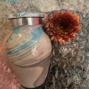 Ashleigh added a photo of their purchase
