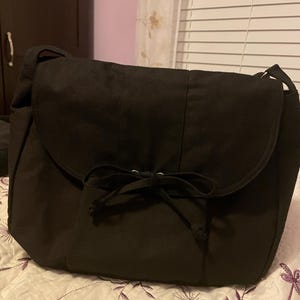 Laura added a photo of their purchase