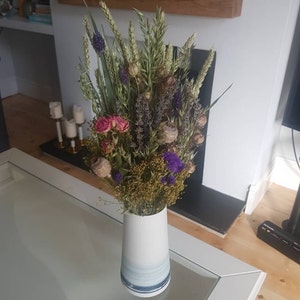Katie added a photo of their purchase