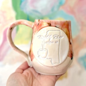 Liz added a photo of their purchase