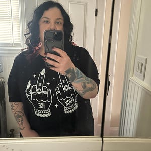 Laura added a photo of their purchase