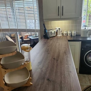 Laura added a photo of their purchase
