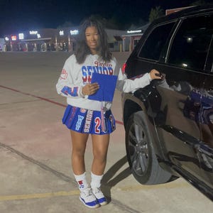 Latoya added a photo of their purchase