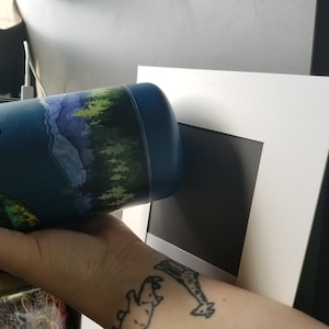 Kimberly added a photo of their purchase
