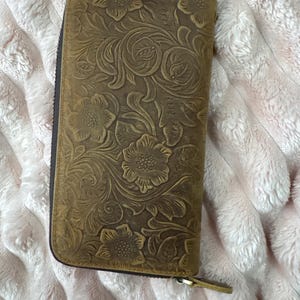 Angela added a photo of their purchase