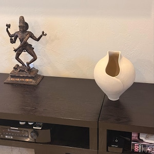 Sharon added a photo of their purchase