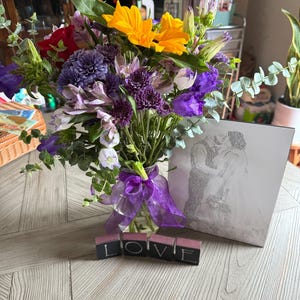 Katie added a photo of their purchase