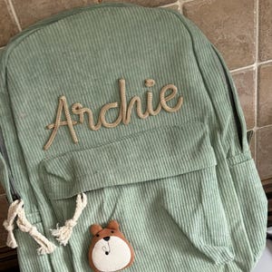 Caitlin added a photo of their purchase